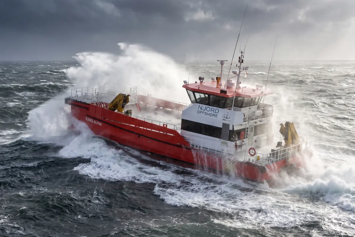 Red WINDORA offshore vessel operating in heavy weather